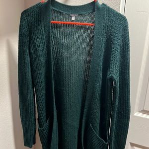 Cute, warm yet thin dark green cardigan, couple years old, hole on left sleeve